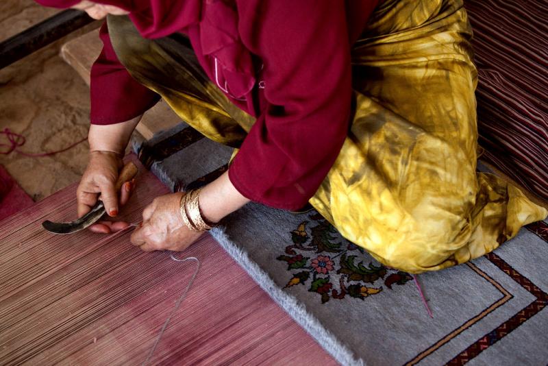 Shirin, works at weaving a carpet (by World Bank Photo Collection is licensed under CC BY-NC-ND 2.0) Shirin, works at weaving a carpet (by World Bank Photo Collection is licensed under CC BY-NC-ND 2.0)